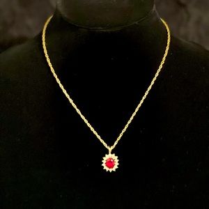 Gold tone necklace with Ruby stone